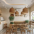 Cozy Café Interior With Wicker Pendant Lights Wooden Tables Milk Tea Sign And Green Plants