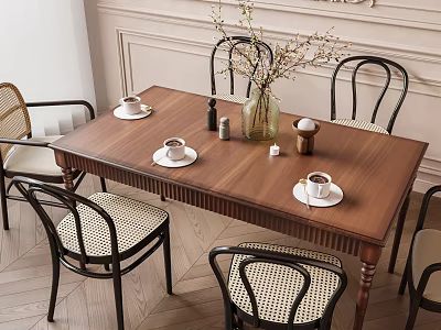 Wooden Dining Table With Black Frame Wicker Seat Chairs Tea Cups Saucers And Flower Vase 3d model