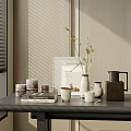 Minimalist Ceramic Tea Set On Wooden Table With Vase Plants Books And Candles