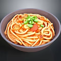 Bowl of Noodles with Red Sauce Chopped Green Onions Sliced Sausage and Garlic
