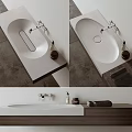 Modern Sleek Washbasin Design With Ceramic Countertop Faucet Toiletries And Towel
