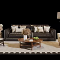 Elegant Leather Sofa With Wooden Coffee Table And Decorative Pillows On Patterned Area Rug