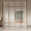 Modern Room Divider With Golden Metal Frame And Transparent Glass Panels In Elegant Interior