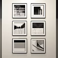 Photo Wall With Black And White Frames Displaying Geometric Patterns On White Wall 3d model