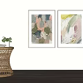 Abstract Framed Paintings On Wall With Woven Side Table And Plants 3d model
