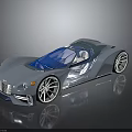 Futuristic Silver Sports Car With Sleek Design And Convertible Blue Top