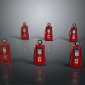 Multiple Vintage Red Fuel Pumps Showcased In Classic Retro Setup