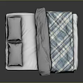 Modern Minimalist Double Bed With Two Gray Pillows Gray Blanket And Blue White Plaid Quilt