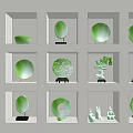 Decorative Green Ornament Set With Carved Circular Designs In White Display Cases On Black Bases