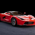 Red Sports Car With Convertible Top And Sleek Design On Dark Floor