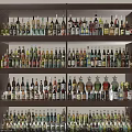 Liquor Cabinet Stocked with Various Wine and Whiskey Bottles on Organized Wooden Shelves