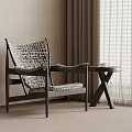 Modern Woven Leisure Chair With Dark Frame And Small Side Table Near Window