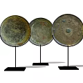 Three Circular Vintage Bronze Plates Decorative Ornament Set on Black Stands