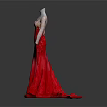 Mannequin Wearing Elegant Red Gradient Gown With Lace Embroidery And Flowing Train Against Dark Background