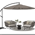 Stylish Woven Outdoor Lounge Chairs With Curved Umbrella Side Table Plant And Round Rug
