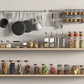Organized Spice Jars On Kitchen Shelves With Hanging Utensils And Assorted Spices
