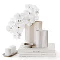 Elegant Decorative Ornament Set With White Orchids Striped Vases Candle Holders And Bowl On Books