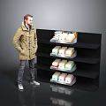 Black Multi tiered Storage Shelf With Various Packaged Items And Man Standing Next To