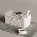 White Vanity Table With Drawers Tray And Table Lamp On Gray Rug And Book Below