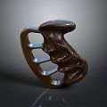 Brown Textured Equipment Accessory With Ergonomic Grip And Metal Accent Design Features