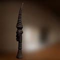 Traditional Hand Carved Wooden Sculpture With Human Face And Pointed Top