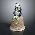 Cute Panda Figurine Sitting On Tree Stump Base With Yellow Flower And Green Leaves