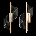 Modern Wall Sconces Featuring Swirl Design Metal Frame and Crystal Accents Against Black Background