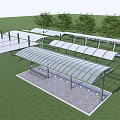 Outdoor Canopy Structure With Benches And Paved Area On Green Grass