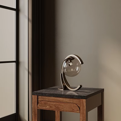 Modern Table Lamp With Metallic Stand And Transparent Spherical Lampshade On Wooden Cabinet 3d model