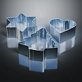 Delicate Metal Cookie Cutters with Star Heart Christmas Tree Shapes on Black Reflective Background