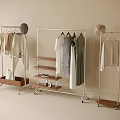 Modern Minimalist Clothes Racks With Drawers Shelves And Light Colored Apparel Hats Shoes