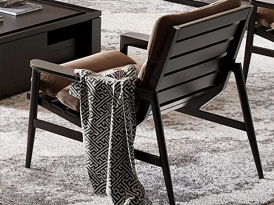 Leisure Chair Featuring Black Frame Brown Cushion and Geometric Pattern Blanket in Living Room 3d model