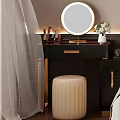 Modern Dressing Table with Round Mirror Gold Accents Cosmetics and Beige Stool