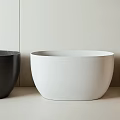Modern Minimalist Bathtub Design With Black White And Beige Colors On Light Surface