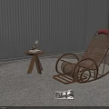 Modern Wicker Rocking Chair In Indoor Setting With Round Rug And Side Table