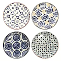 Four Decorative Plates Featuring Intricate Colorful Geometric Circular and Dotted Patterns