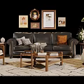 Black Leather Sofa With Pillows And Wooden Coffee Table In Living Room With Wall Art