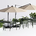 Outdoor Garden Table and Chair Set With Beige Umbrellas And Green Plants