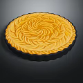 Homemade Freshly Baked Golden Round Tart With Intricate Spiral Swirl Design