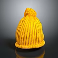 Yellow Knit Beanie With Pom Pom Top And Ribbed Texture On Dark Background