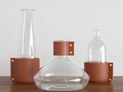 Modern Ceramic Vessels With Transparent Design And Brown Leather Wraps On Wooden Table 3d model