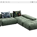 Green Velvet Sectional Sofa With Modular Design And Patterned Decorative Pillows 3d model