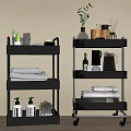 Black Rolling Multi-tier Bathroom Storage Shelving Unit with Towels Toiletries and Decorative Plants