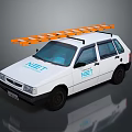 White Compact Car With Orange And White Roof Rack And NET Logo