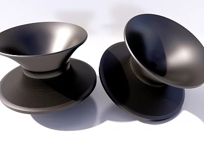 Modern Black Single Chairs With Sleek Smooth Surface And Textured Wave Pattern Bases 3d model