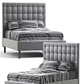 Grey Upholstered Double Bed With Tufted Headboard And Striped Bedding In Bedroom