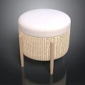 Round Rattan Stool with White Padded Seat and Wooden Legs Design