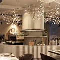 Modern Restaurant Interior With Leaf Shaped Chandeliers Dining Table Chairs And Orchids 3d model