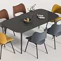 Modern Oval Black Dining Table Set With Six Brown Yellow Gray Chairs Fruit Bowl Magazine