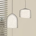 Two Beige Dome Shaped Felt Pendant Lights With Soft Lighting Near Window Blinds